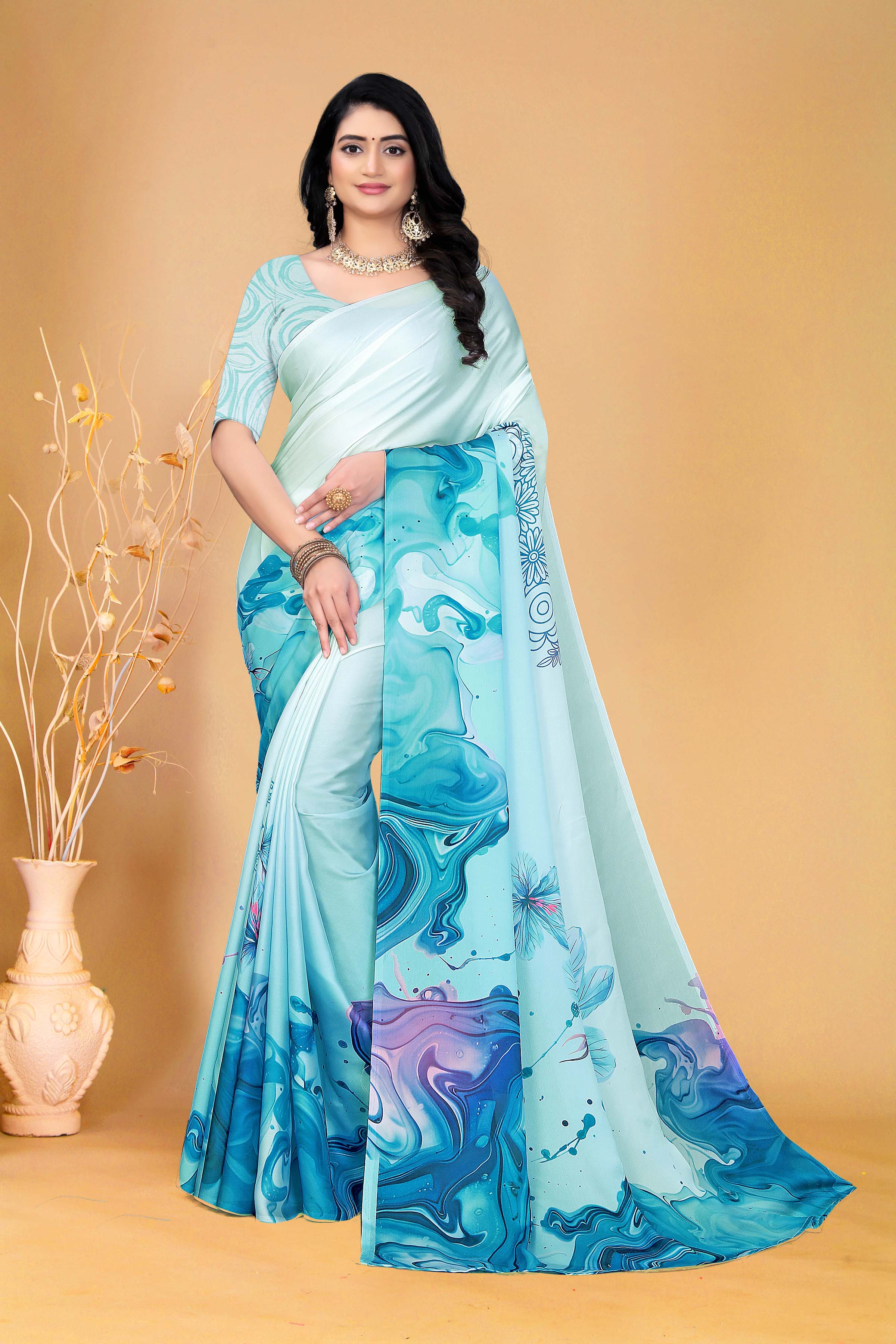 Soothing Aqua Blue Saree with Marble Print and Floral Accents for a Contemporary Ethnic Statement Look