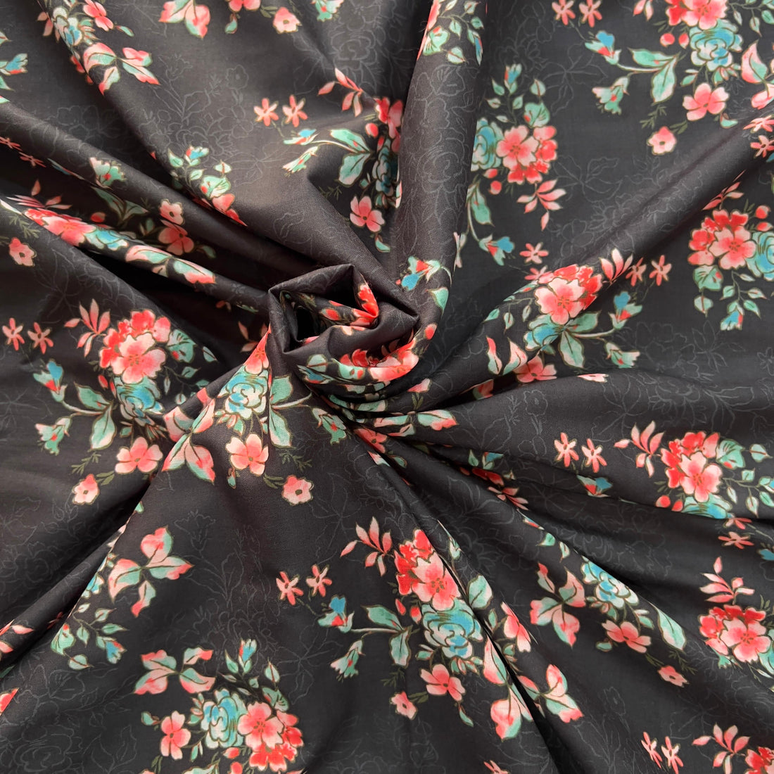 black floral design on cambric