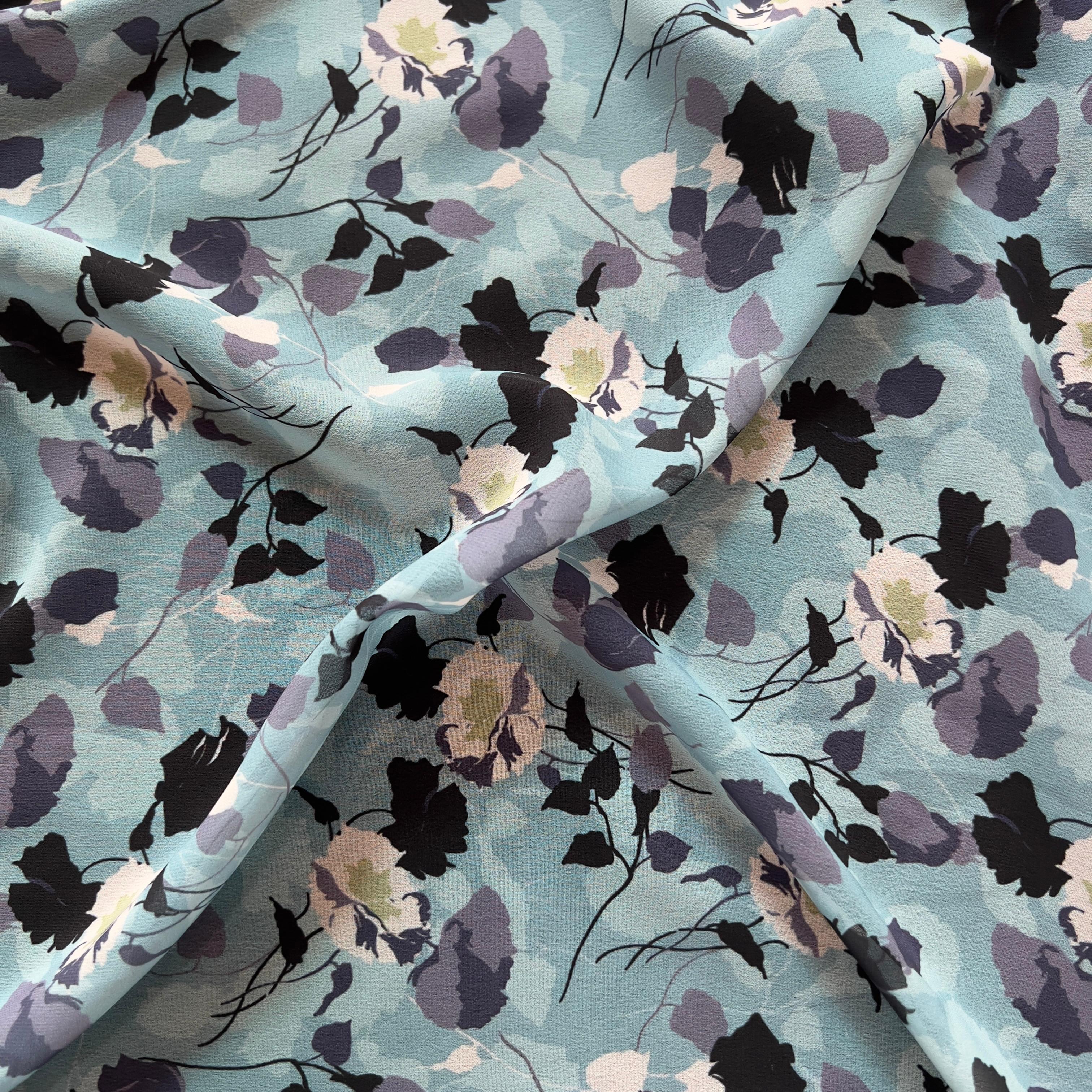 Overlapping blue floral design on georgette