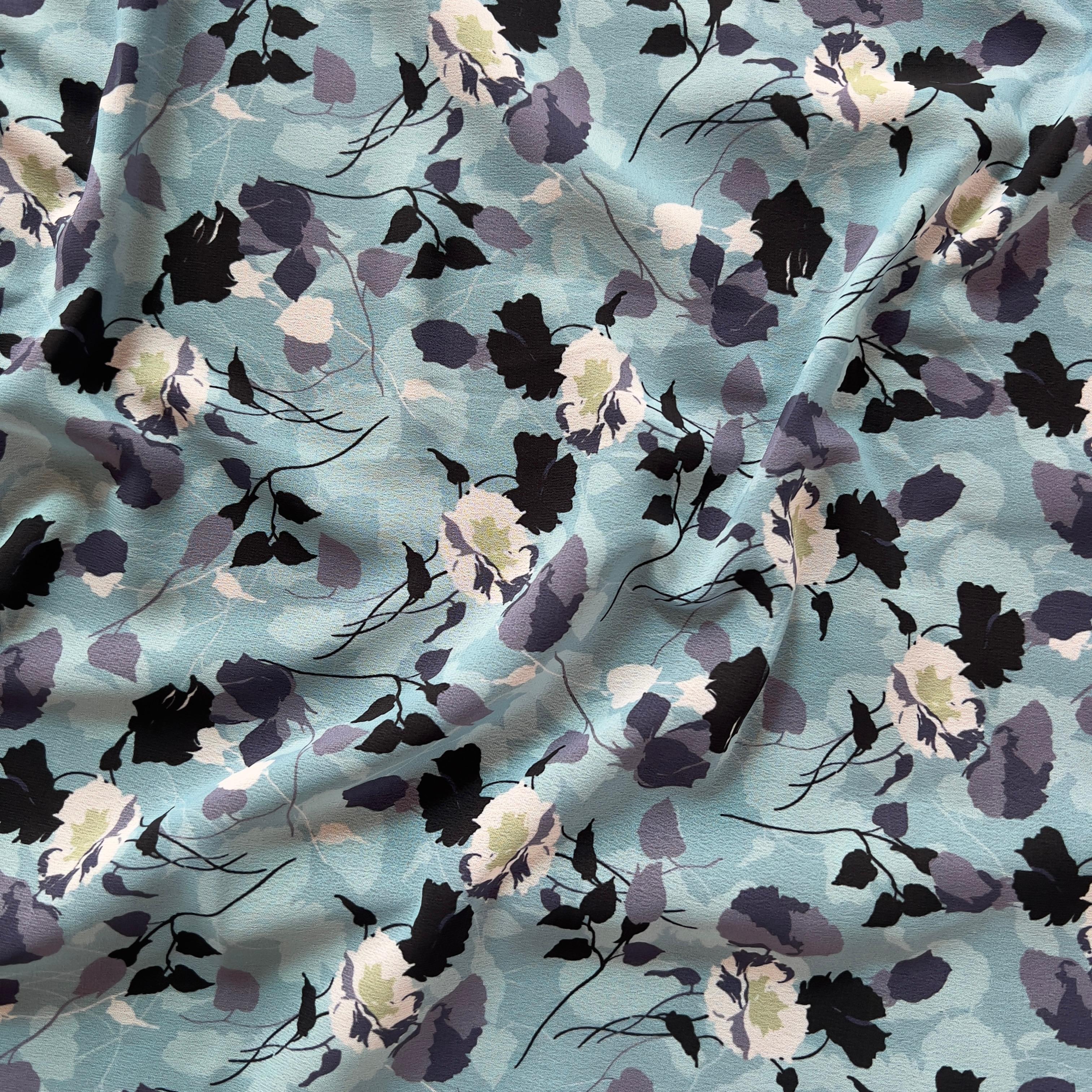 Overlapping blue floral design on georgette