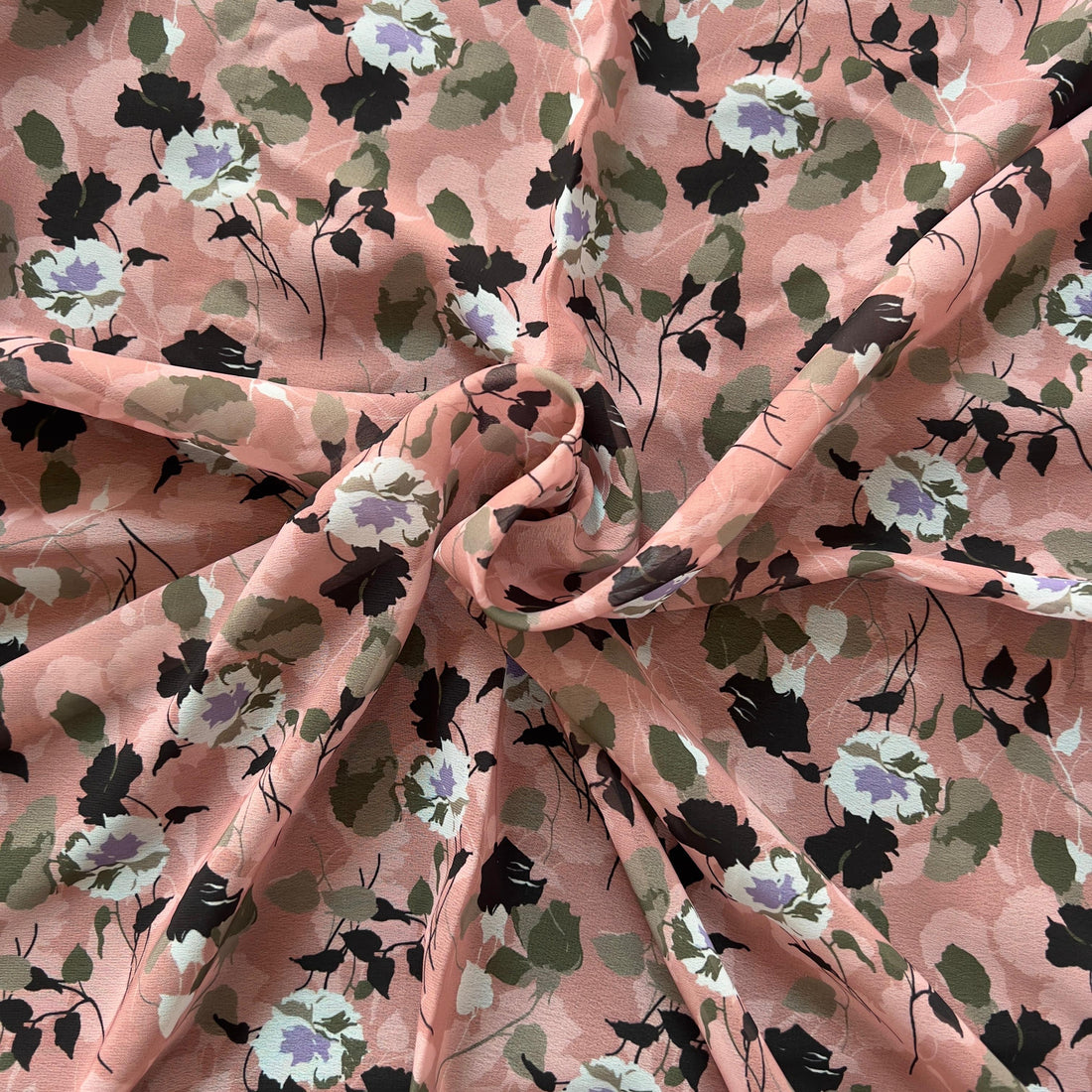 Overlapping dusty rose floral design on georgette